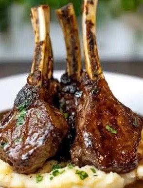 Double Lamb Chop pomogranete glaze side of roasted sweet potatoes