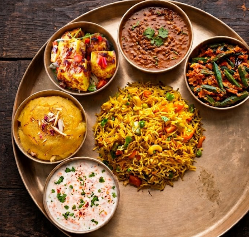 Tandoori Tofu Thali (Vegan) with Daal Makhni, Bhindi Masala, Veg Pulao, Vegan Salad of the Day, Vegan Raita of the Day