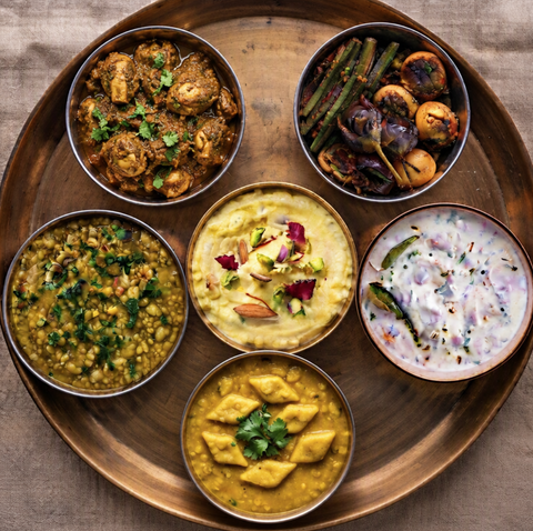 Thecha Chicken Thali with Daal Dhokli, Tawa Sabzi, Jowar Khichadi, Shrikhand, Raita of the Day